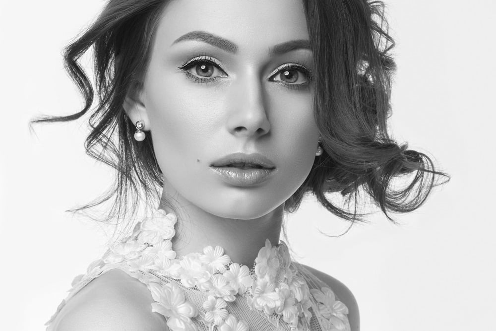 Woman with youthful facial fullness illustrating facial volume restoration with Sculptra®.